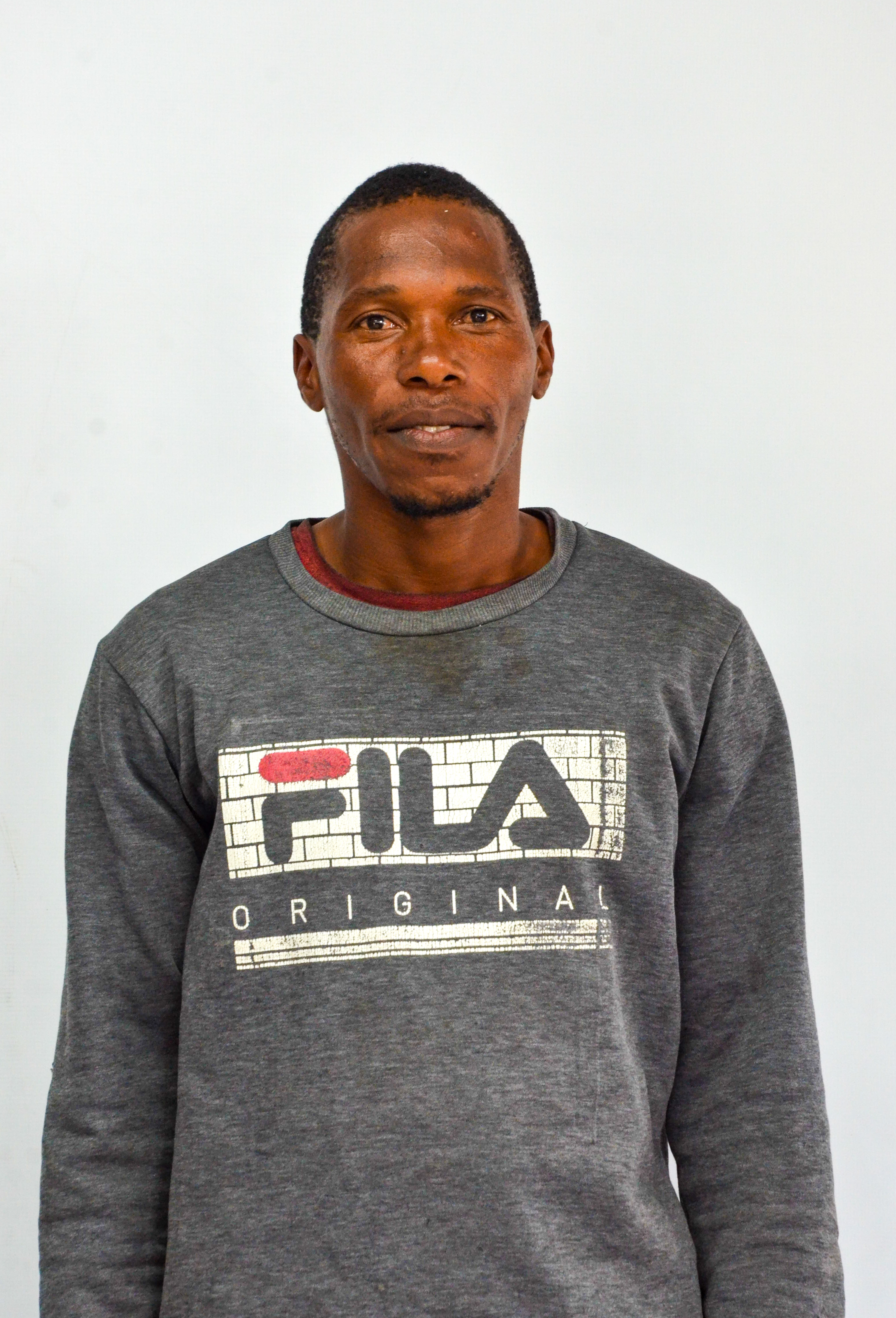 Mr. T Buthelezi